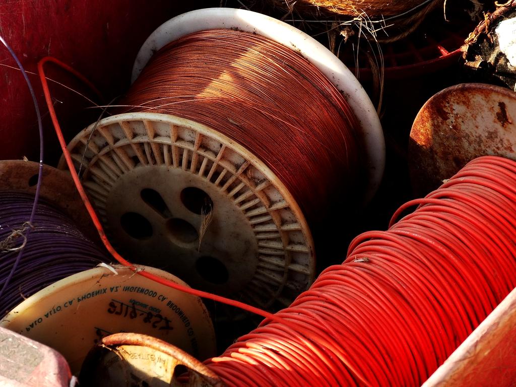 Organized cables and chargers on modern desk setup